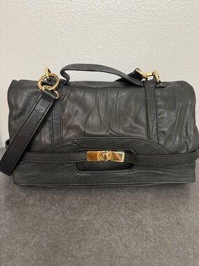 BCBGMaxAzria Black Leather Handbag with Embossed Logo